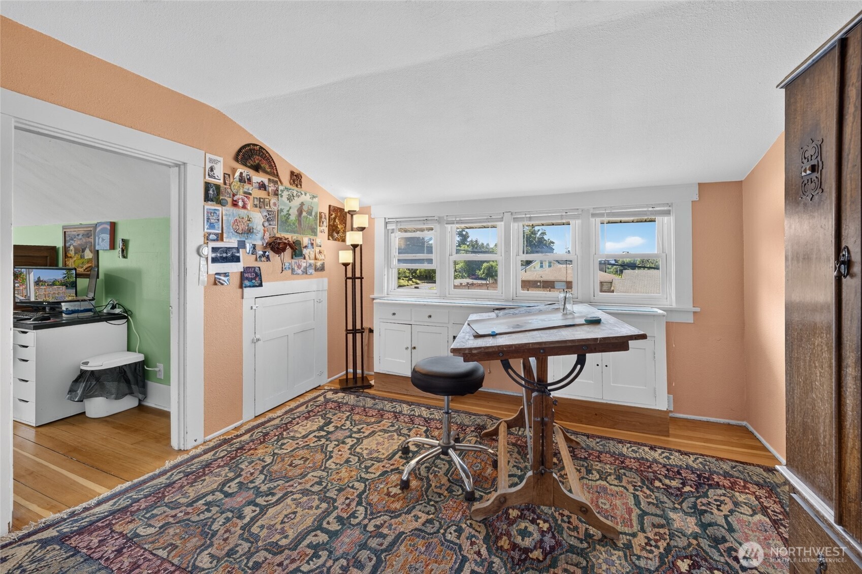 237 West 3rd Street Port Angeles, WA 98362 - Photo 26 of 40 a living room with furniture and a rug