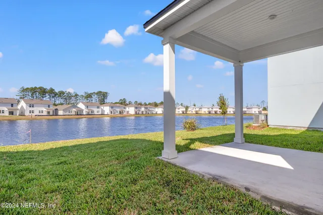 a view of yard with swimming pool