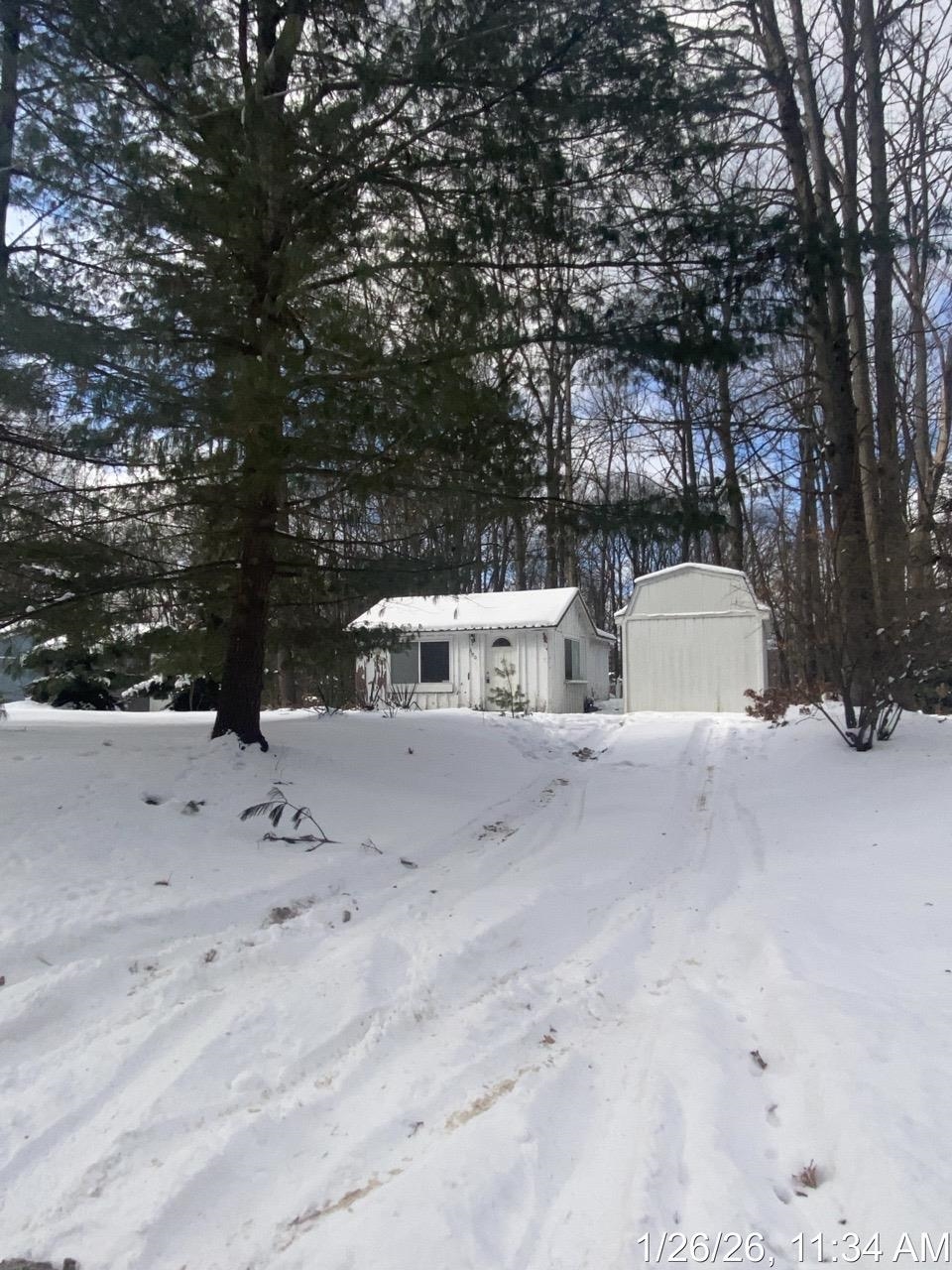 590 Wilson Road Harrison, MI 48625 - Photo 4 of 17 50198269-6fa4c533-e944-42b0-a028-1997ac9128cb.JPG