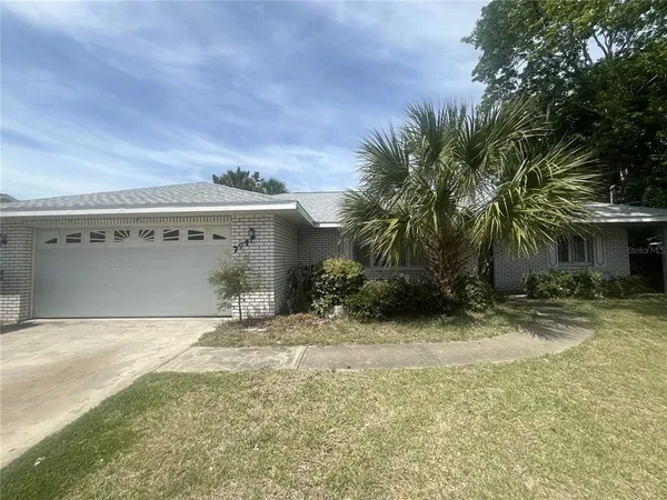 a view of a house with a patio