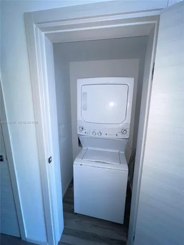 a view of a swimming pool with a garden and plants