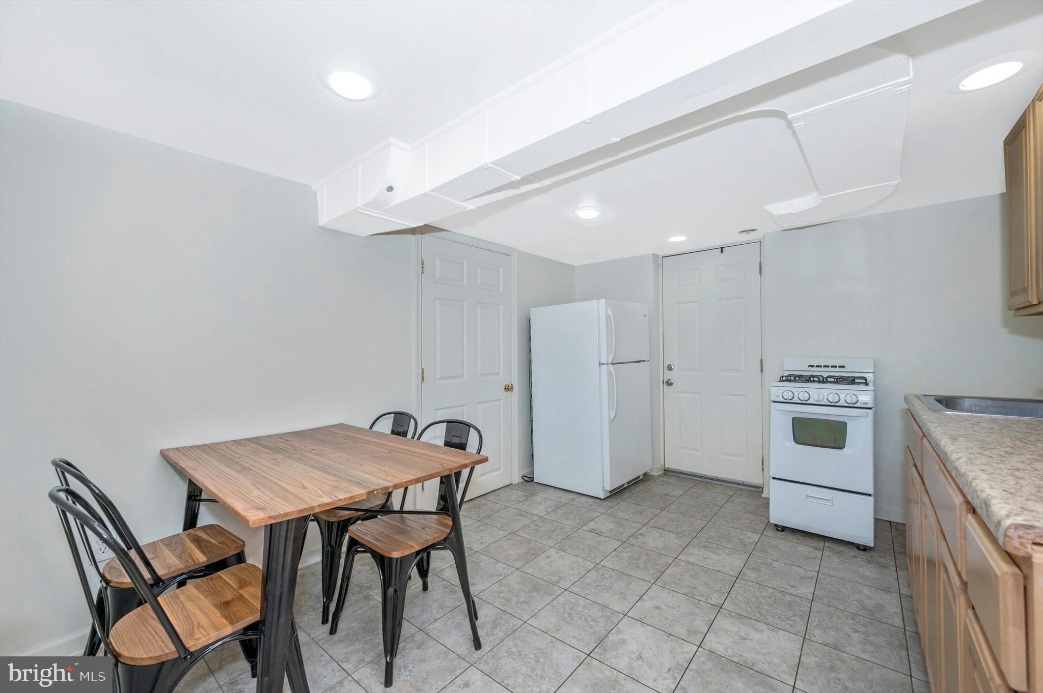 9521 Riggs Road Adelphi, MD 20783 - Photo 34 of 51 Lower Level Kitchen w/Gas Cooking