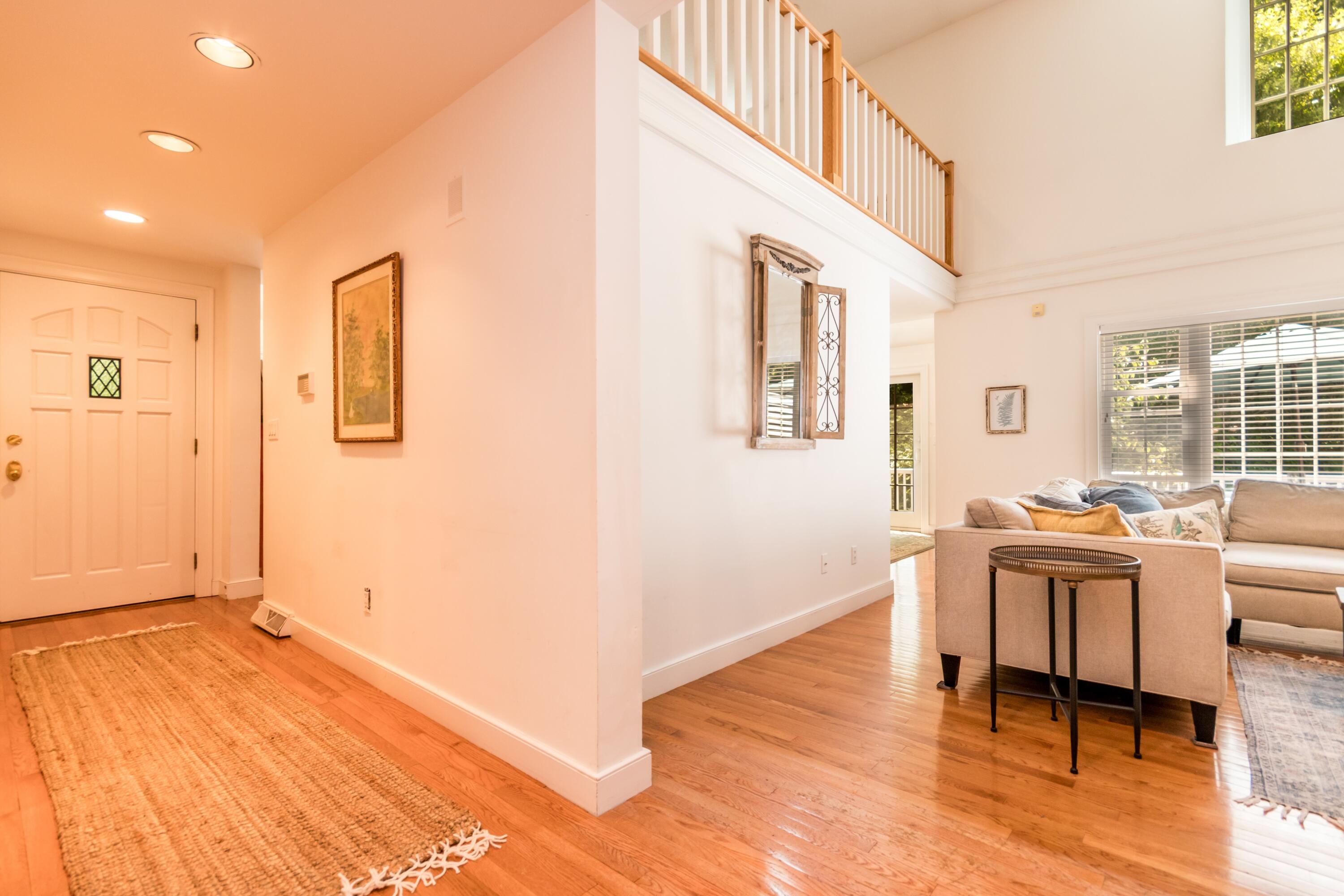 15 Hampton Court, Unit 15 Mashpee, MA 02649 - Photo 14 of 40 Foyer opens to living room