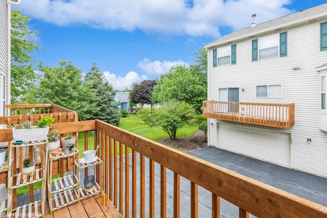 a view of balcony with furniture