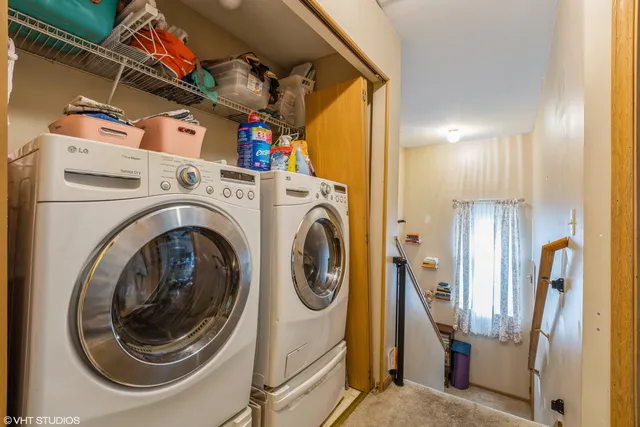 a utility room with dryer and washer