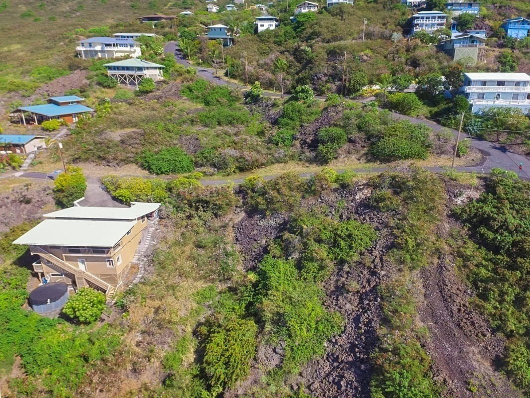 263 Japonica Road Captain Cook, HI 96704 - Photo 4 of 10 an aerial view of residential house with outdoor space and trees all around