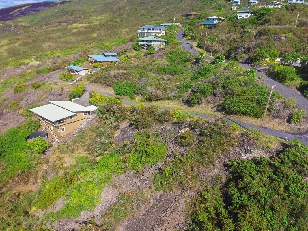 263 Japonica Road Captain Cook, HI 96704 - Photo 4 of 10 an aerial view of residential house with outdoor space and trees all around