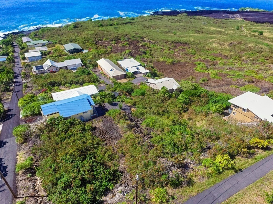 263 Japonica Road Captain Cook, HI 96704 - Photo 5 of 10 a view of a yard with an outdoor space