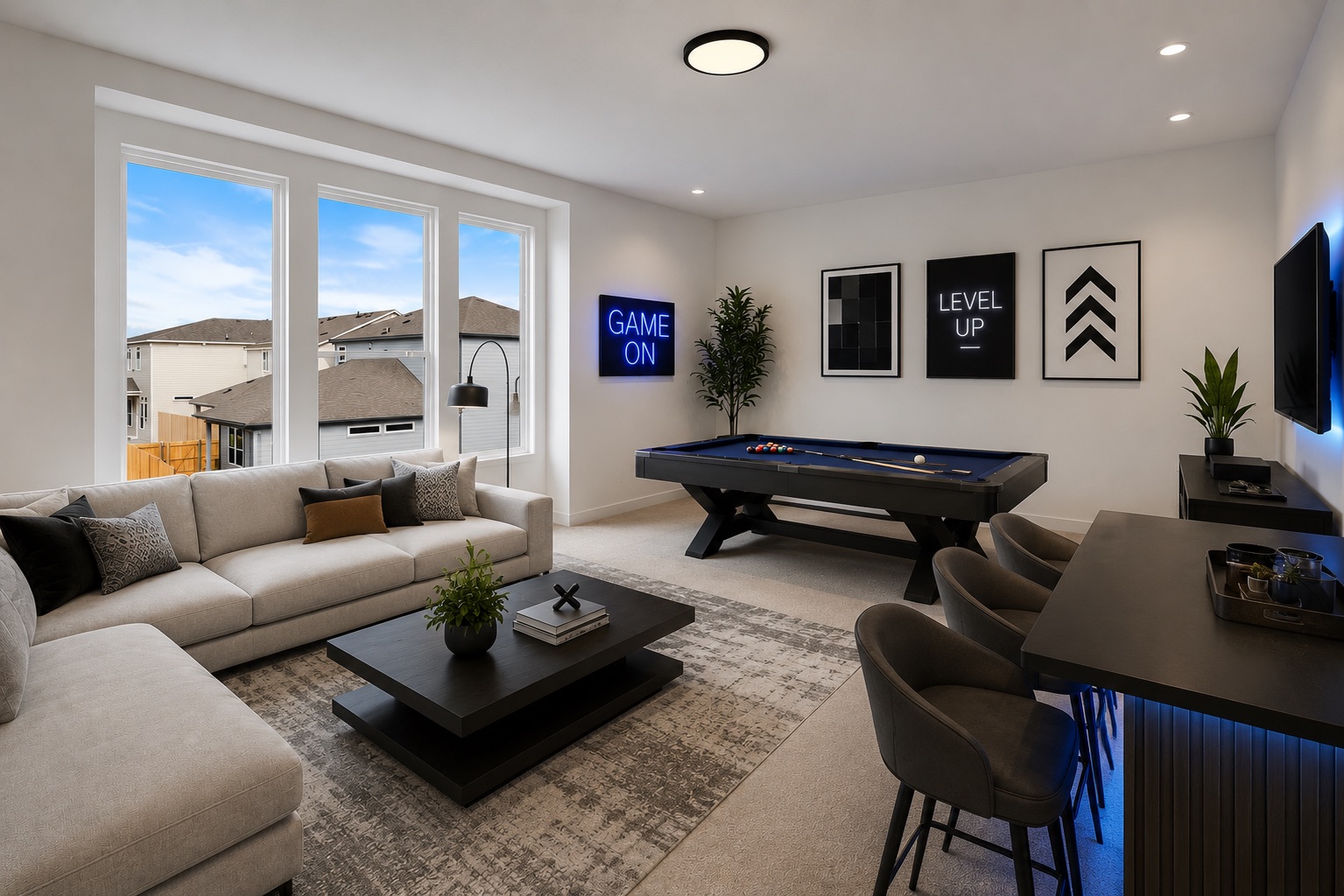2205 Cento Walk Round Rock, TX 78664 - Photo 21 of 35 This versatile game room offers ample space for entertaining with a billiard table and comfortable seating.