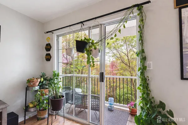 a view of a balcony with furniture