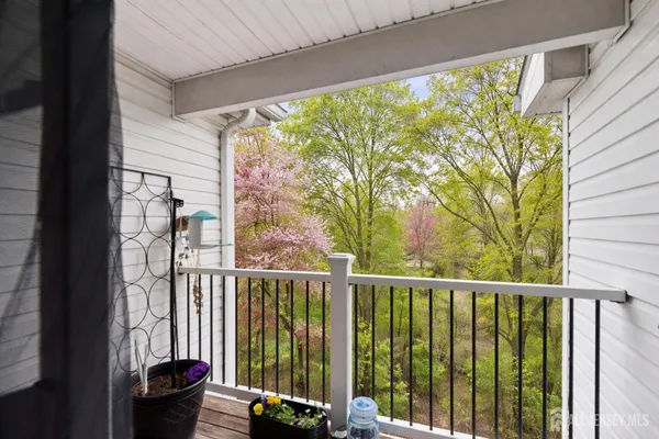 a view of a balcony with chair