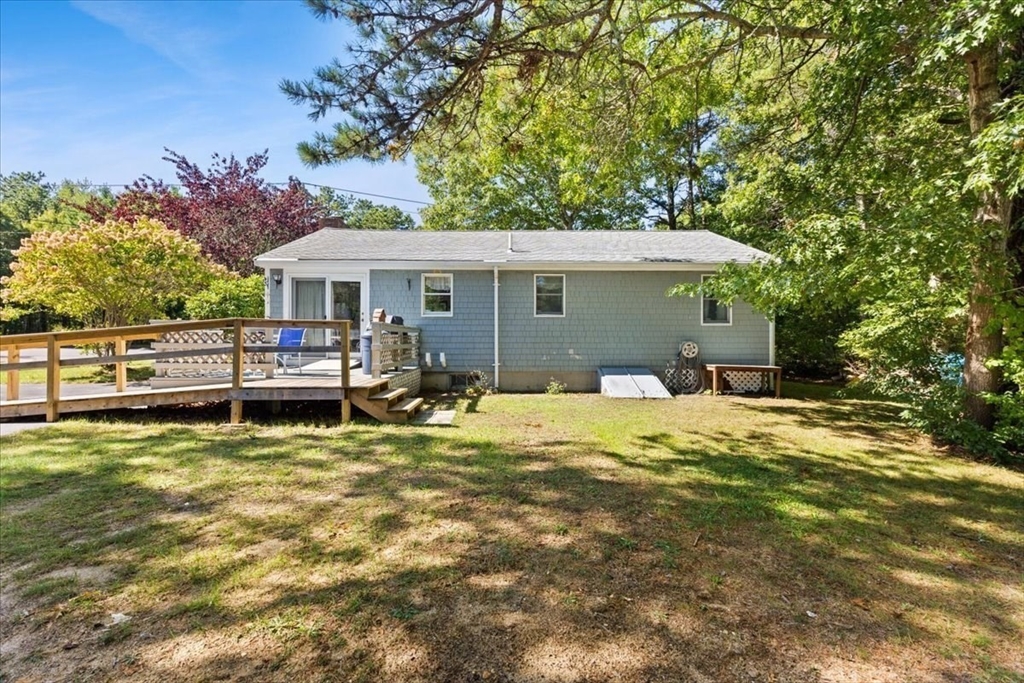 83 Red Brook Road Wareham, MA 02532 - Photo 22 of 36 a view of a house with swimming pool