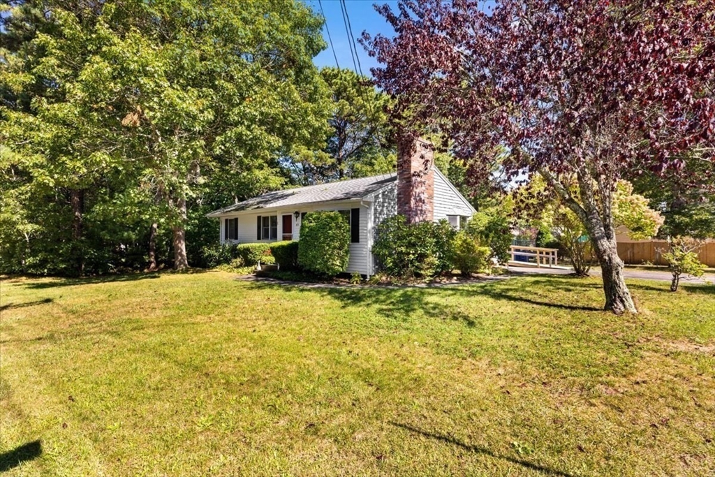 83 Red Brook Road Wareham, MA 02532 - Photo 25 of 36 a view of a house with pool and sitting area