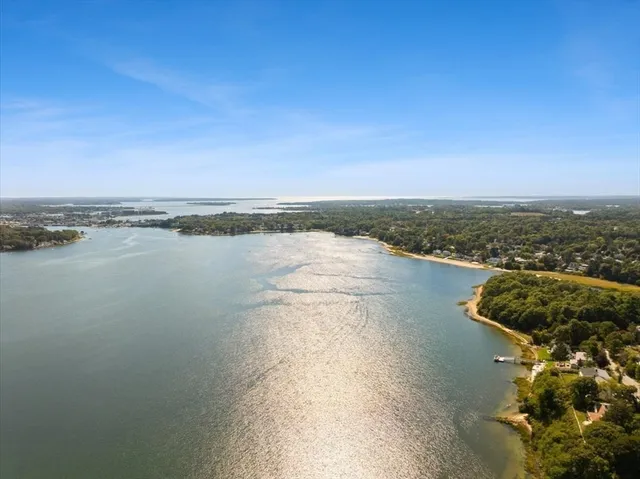 a sign board with a small yard