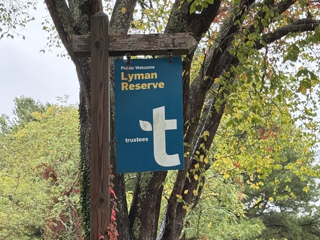 83 Red Brook Road Wareham, MA 02532 - Photo 32 of 36 a sign that is on the side of a tree