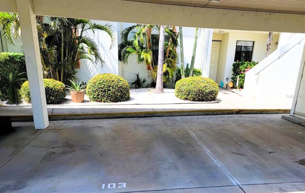 2275 South McCall Road, Unit 103 Englewood, FL 34224 - Photo 14 of 17 a view of a house with a street