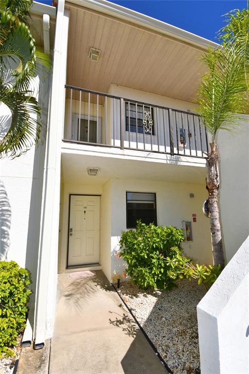 2275 South McCall Road, Unit 103 Englewood, FL 34224 - Photo 15 of 17 front view of a house