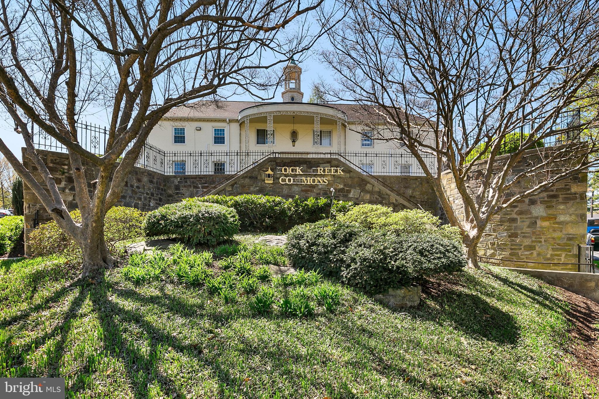2211 Washington Avenue, Unit 303 Silver Spring, MD 20910 - Photo 28 of 28 a front view of a house with a yard