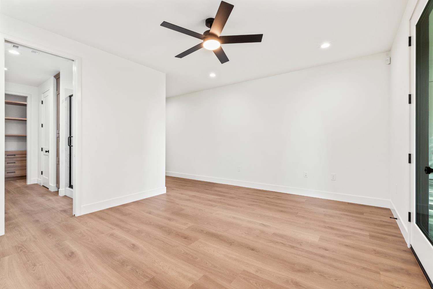 688 Cindy Drive Ripon, CA 95366 - Photo 24 of 57 wooden floor in an empty room with a window