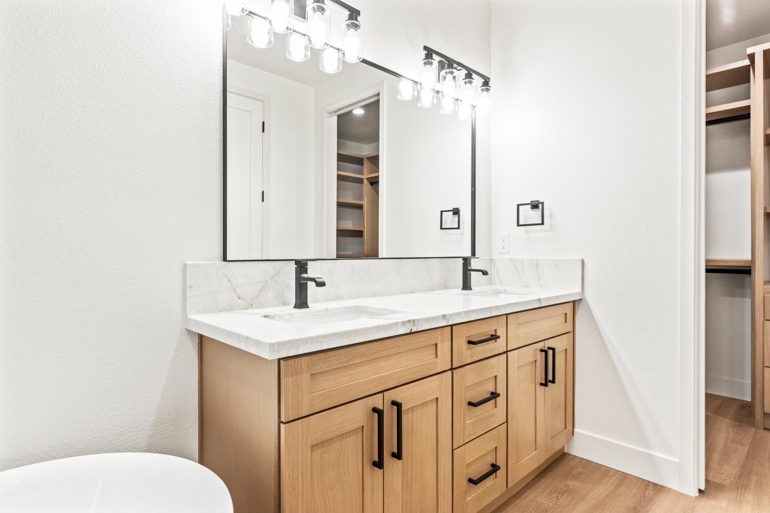 688 Cindy Drive Ripon, CA 95366 - Photo 29 of 57 a bathroom with a toilet sink and mirror