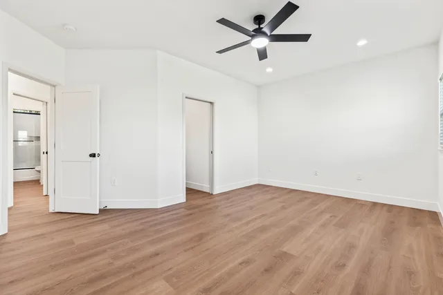 a view of an empty walk in closet
