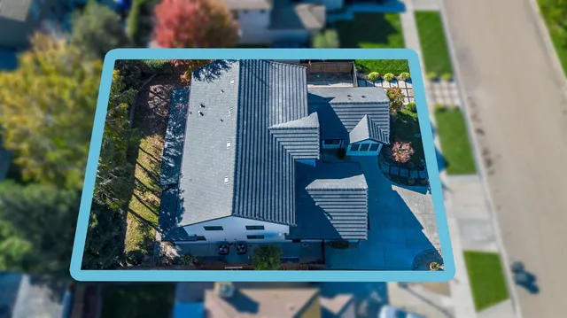 a house with swimming pool in front of it