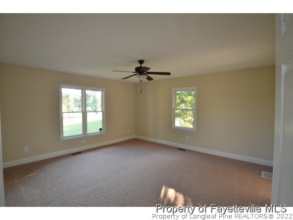 2651 Blossom Road Hope Mills, NC 28348 - Photo 13 of 25 a view of an empty room with a window