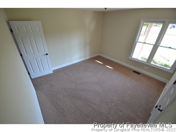 2651 Blossom Road Hope Mills, NC 28348 - Photo 17 of 25 a view of empty room with window