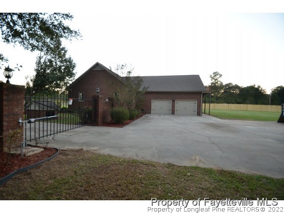 2651 Blossom Road Hope Mills, NC 28348 - Photo 2 of 25 a view of outdoor space and yard
