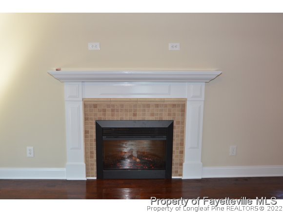 2651 Blossom Road Hope Mills, NC 28348 - Photo 6 of 25 a living room with a fireplace