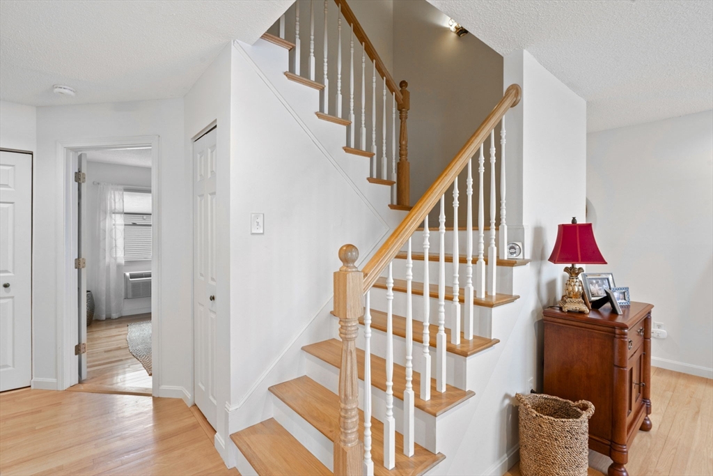 121 Water Street, Unit 44 Beverly, MA 01915 - Photo 12 of 24 a view of entryway with wooden floor