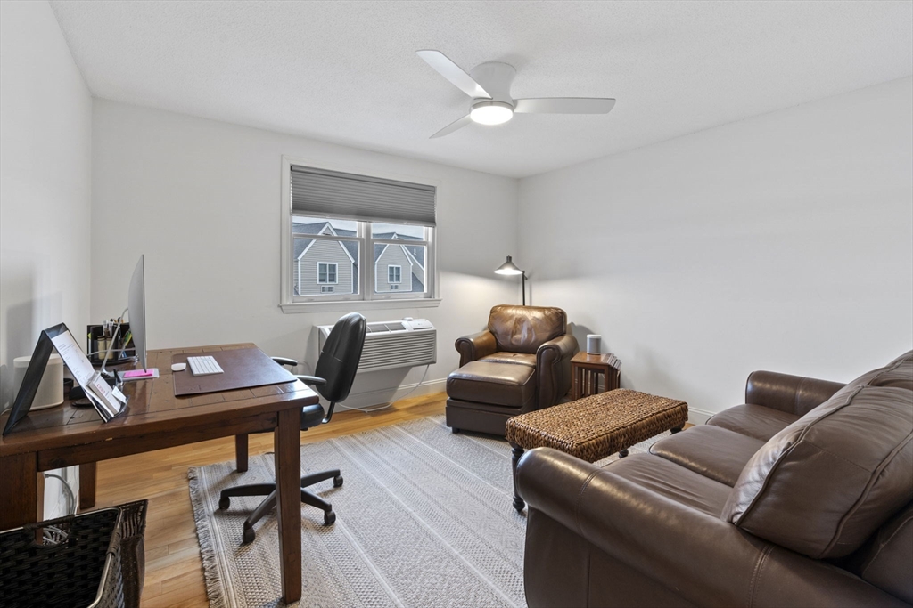 121 Water Street, Unit 44 Beverly, MA 01915 - Photo 14 of 24 a living room with furniture