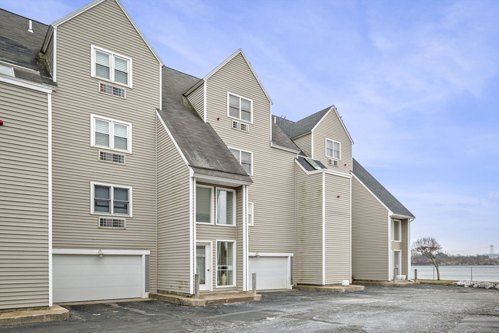 121 Water Street, Unit 44 Beverly, MA 01915 - Photo 21 of 24 a view of a house with a street