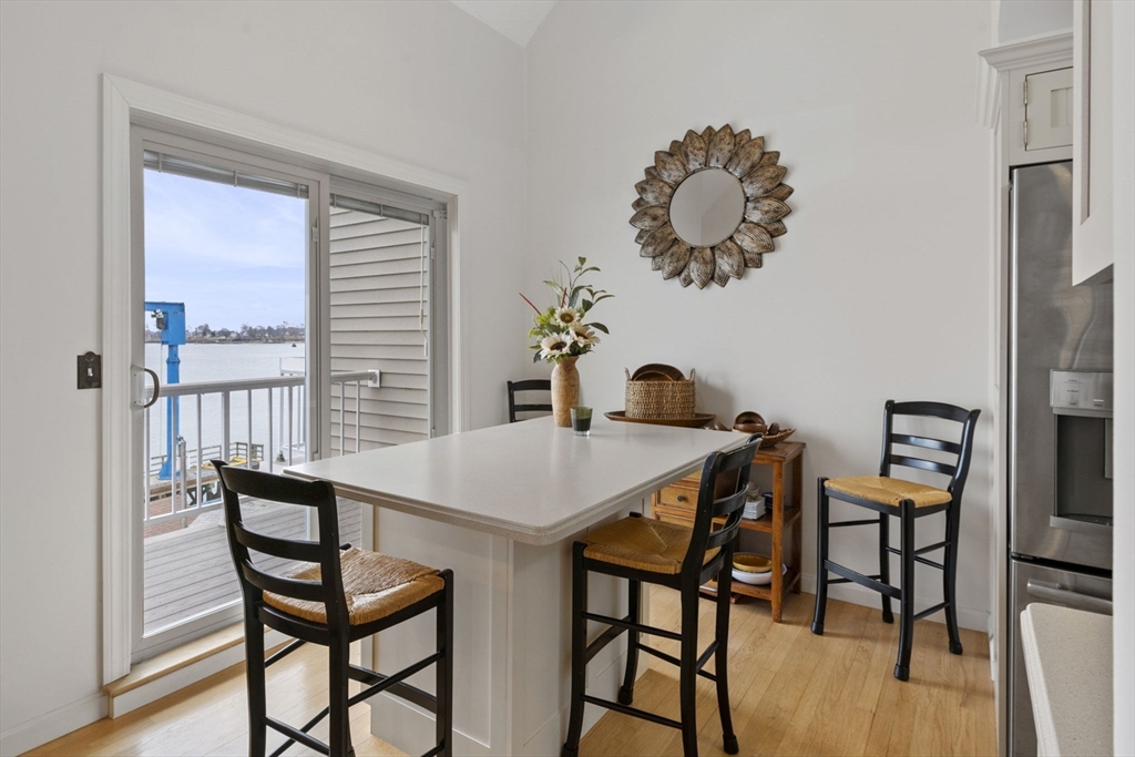 121 Water Street, Unit 44 Beverly, MA 01915 - Photo 5 of 24 a dining room with furniture and window