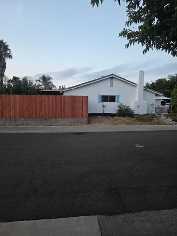 a house view with a garden space