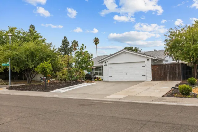 a house view with a garden space