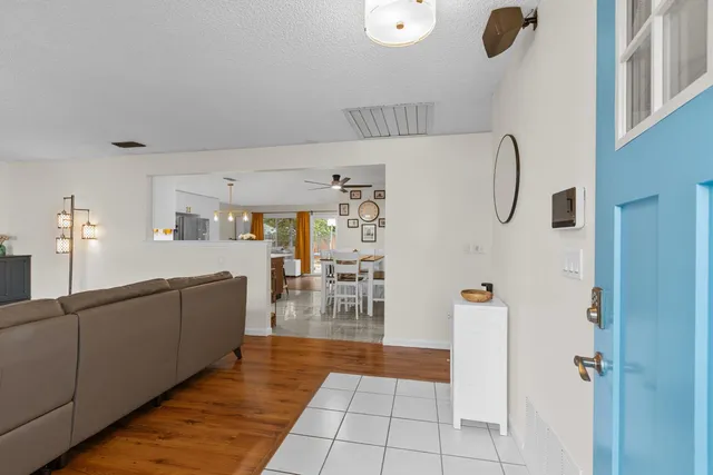 a view of a kitchen from the hallway