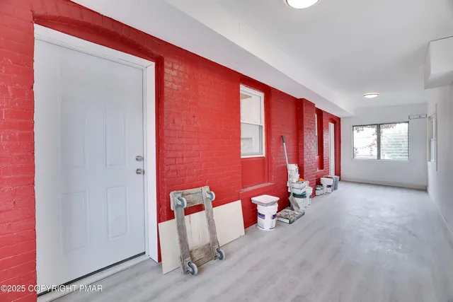 wooden floor and windows in a room