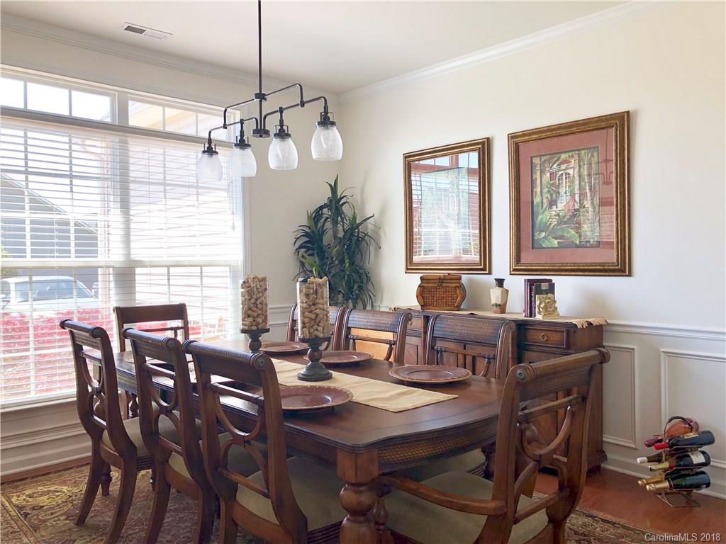 277 Yadkin Road Fletcher, NC 28732 - Photo 4 of 15 a view of a dining room with furniture window and outside view