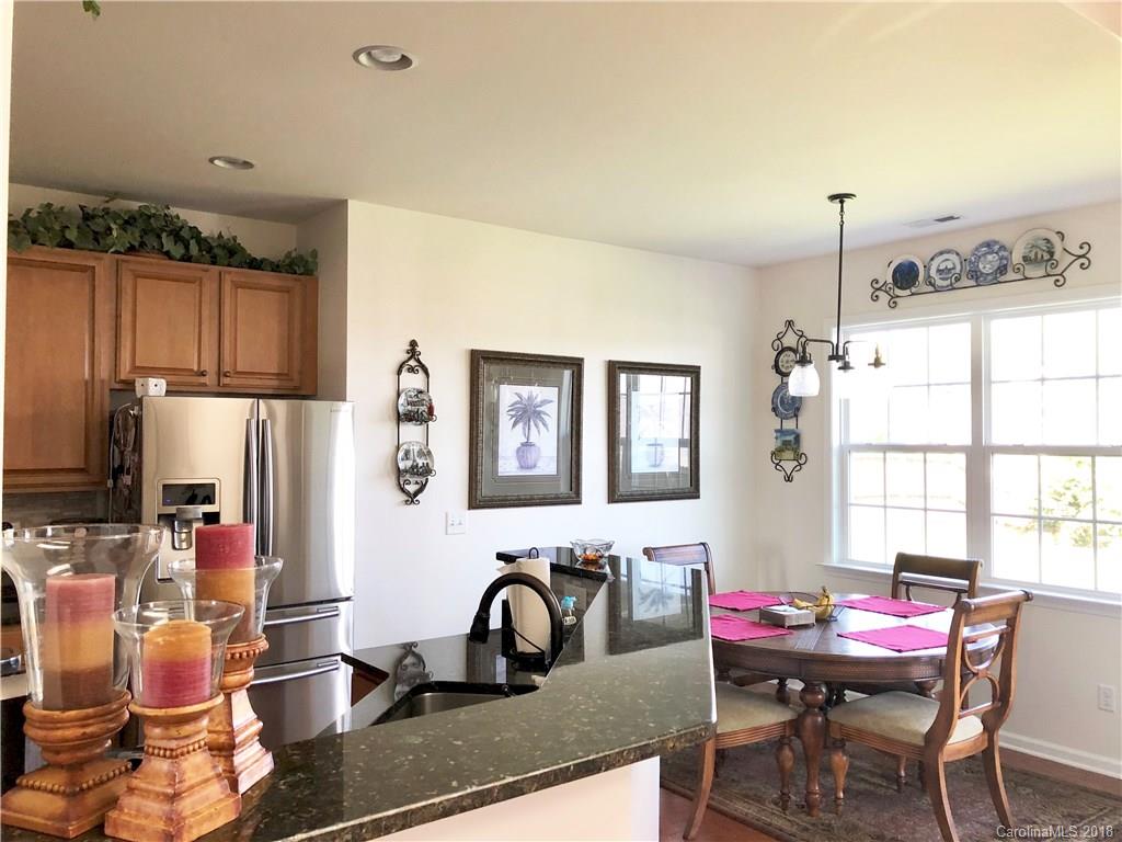 277 Yadkin Road Fletcher, NC 28732 - Photo 5 of 15 a view of a dining room with furniture