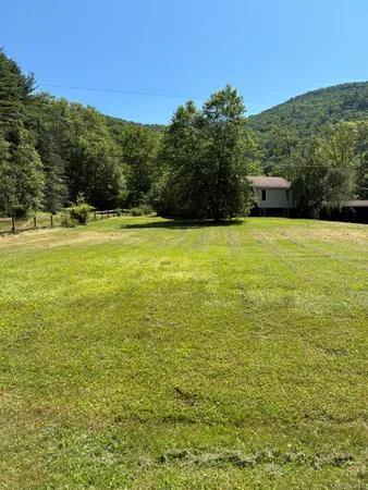 a view of a house with a swimming pool