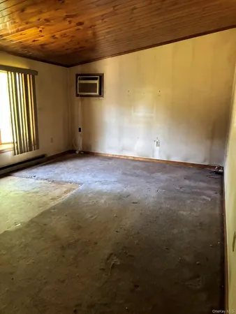 a view of a big room with wooden floor