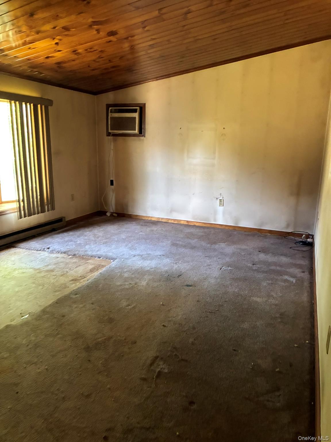 1140 Harvard Road East Branch, NY 13756 - Photo 3 of 29 a view of a big room with wooden floor