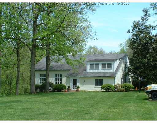 Exterior Front. Stately Farm house on 21 acres of which  5 acres are level to rolling.