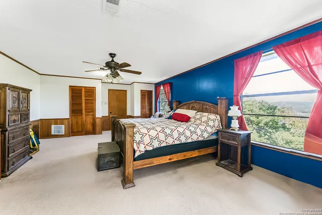 a view of a balcony with wooden floor