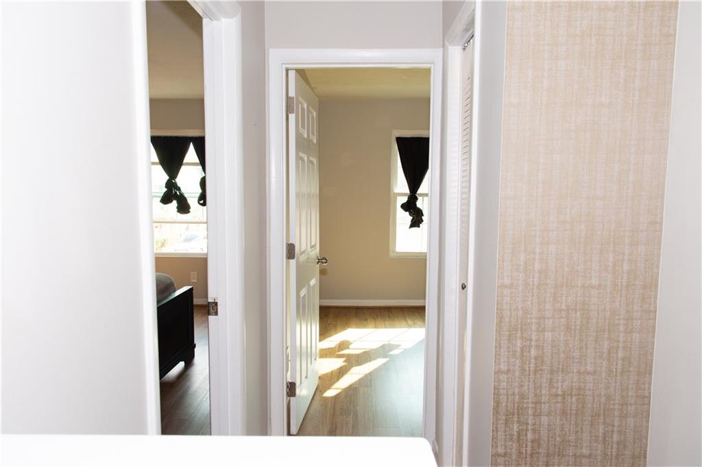 1311 Old Coach Road Southwest Marietta, GA 30008 - Photo 7 of 8 a view of a bathroom from a corridor