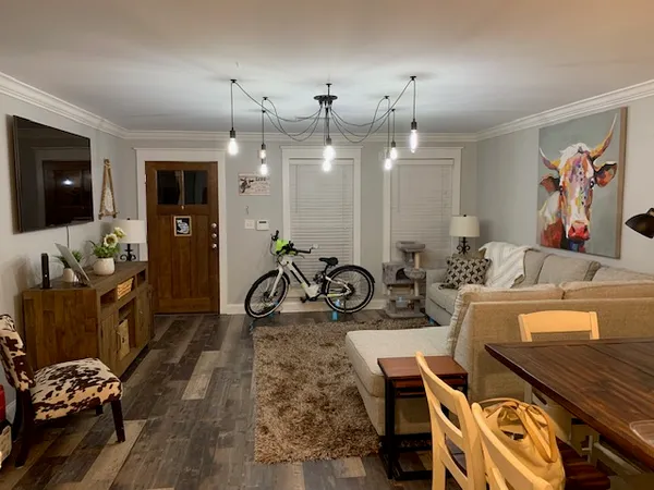 a bathroom with a toilet sink and shower