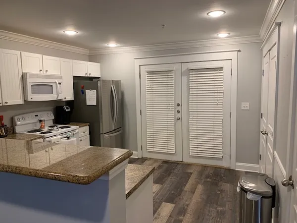 a very nice looking room with many windows