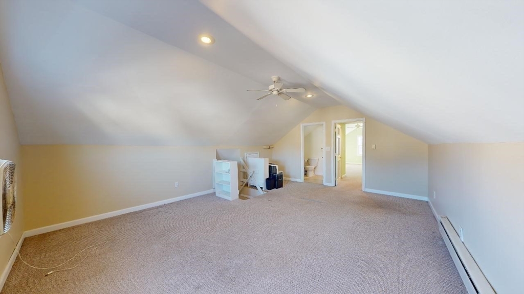 17 Gorham Road, Unit 2 Medford, MA 02155 - Photo 25 of 37 an empty room with projector and windows