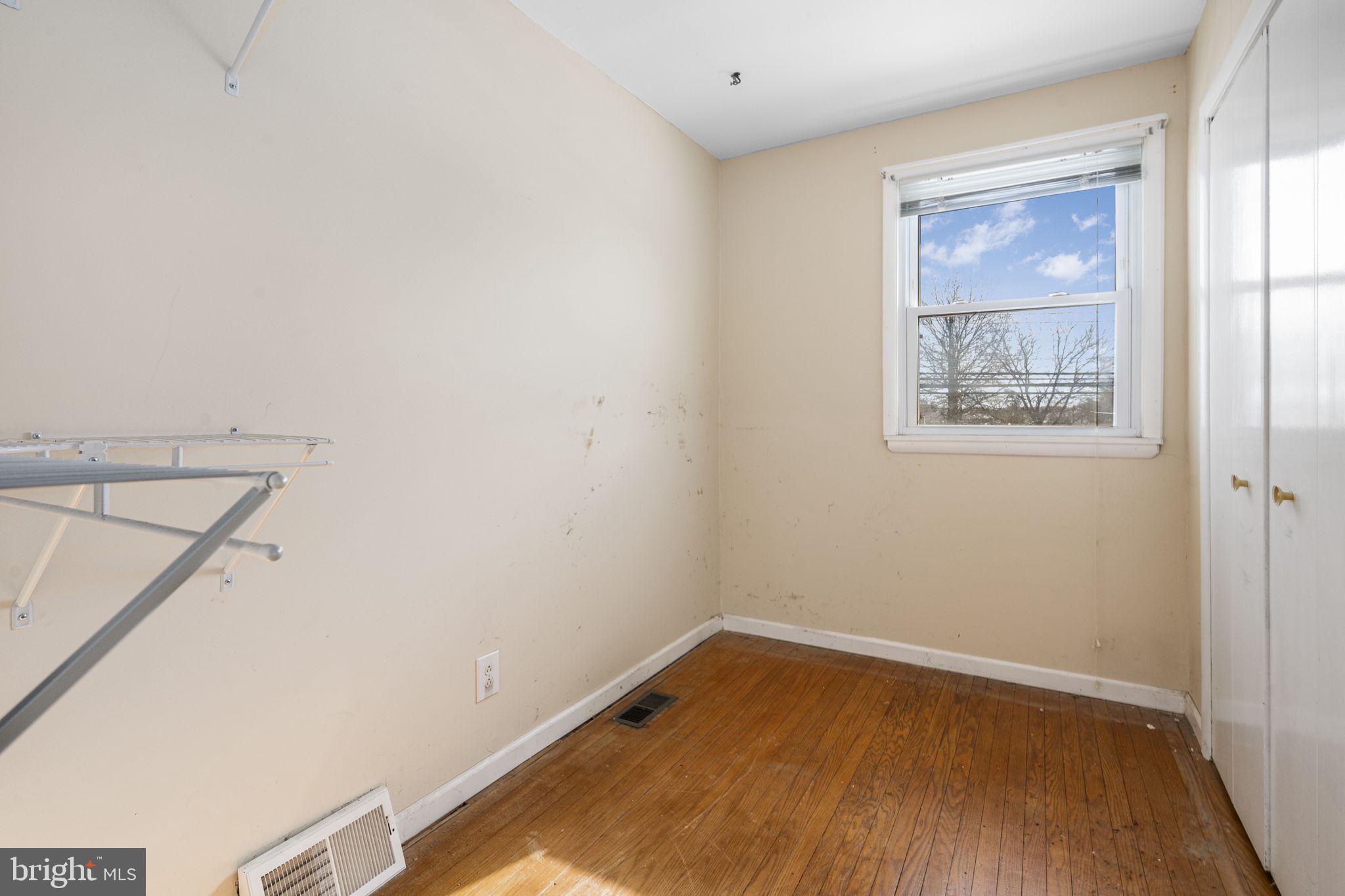 146 Ross Road King of Prussia, PA 19406 - Photo 14 of 27 a view of an empty room with wooden floor and a window